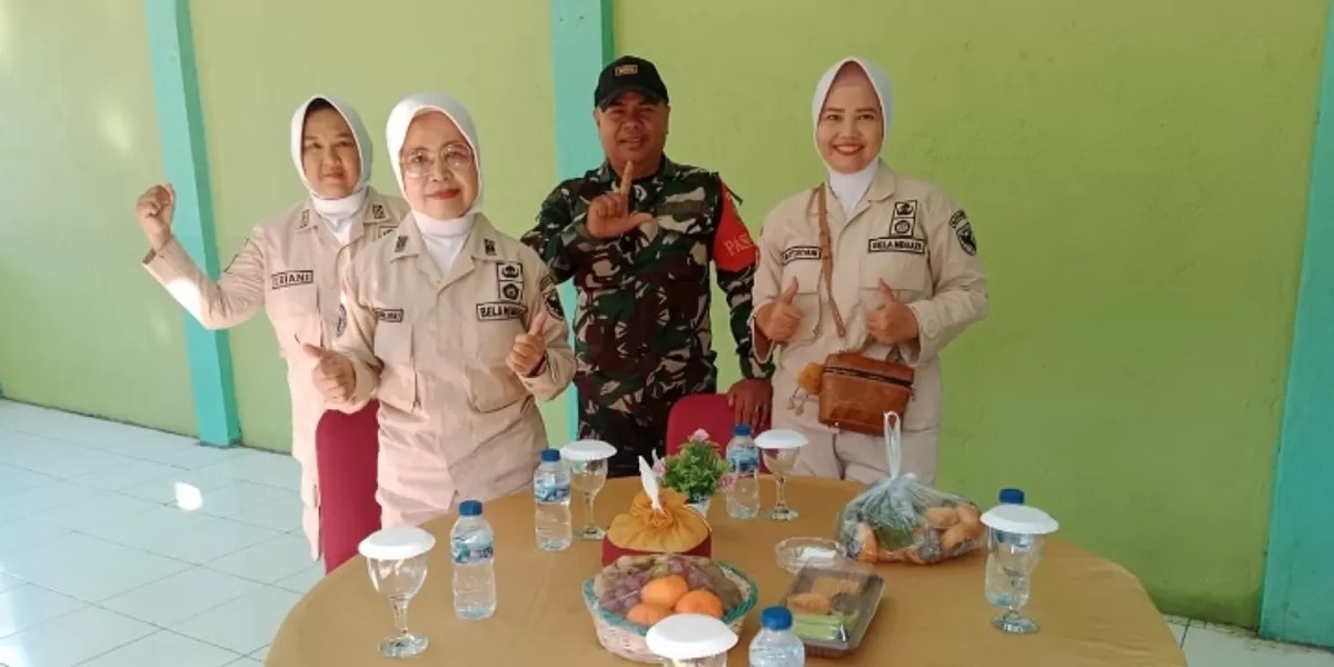 Kapten CKE Yuliansyah Sambut Kedatangan Danrem 044/GAPO di Lokasi TMMD 128