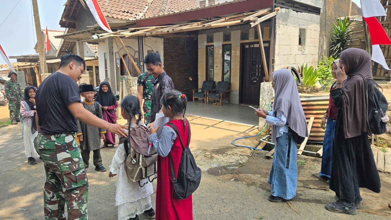 Kegiatan Santai Satgas TMMD 130: Berinteraksi Ceria dengan Anak-anak Desa Taji